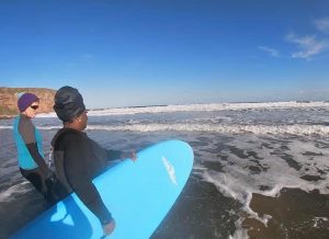 Groundswell Scotland's surf therapy programme with Scotland's afro Caribbean societyi